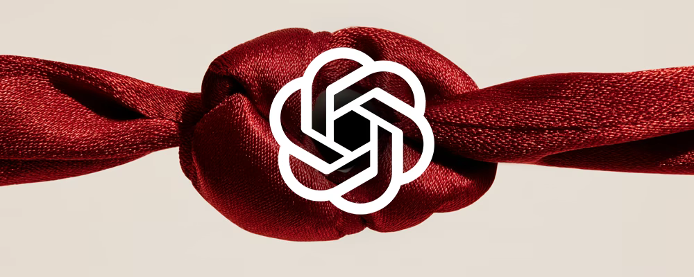 White OpenAI logo over a knot of red silk on a cream background